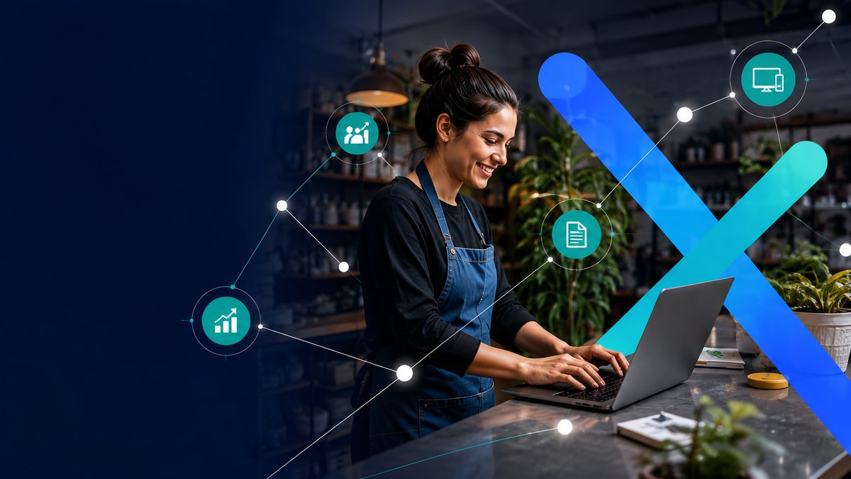 Emprendedora trabajando en su negocio, conectada a las soluciones NEXIO